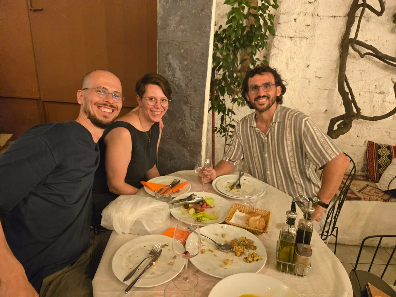 Tirana food tour with local guide and travelers tasting traditional Albanian dishes