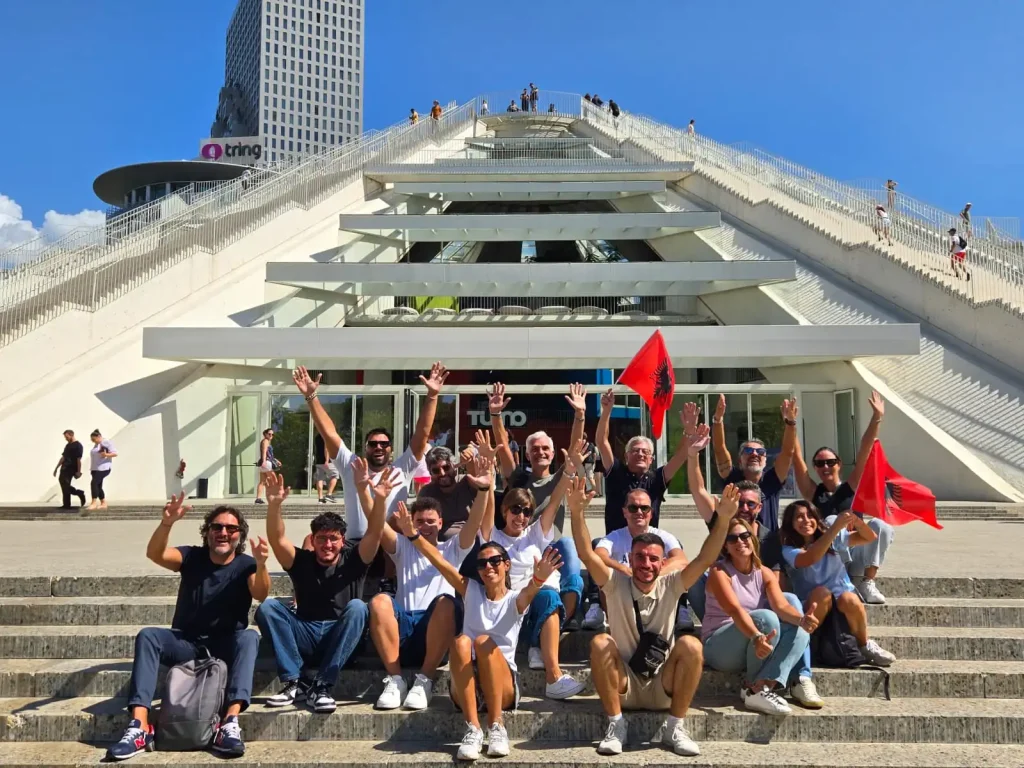Group of travelers enjoying a local food tour experience in Tirana, Albania